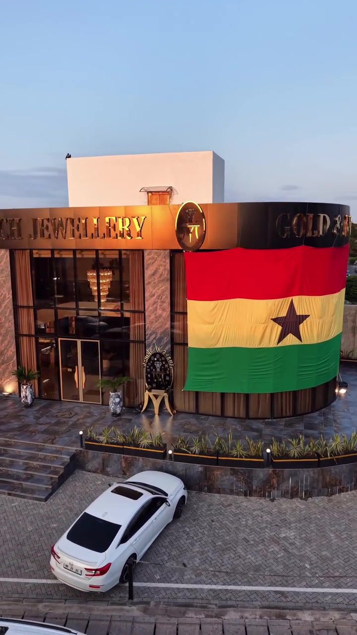 The Morgan Touch showroom exterior in Labone, with a Ghanaian flag across the facade